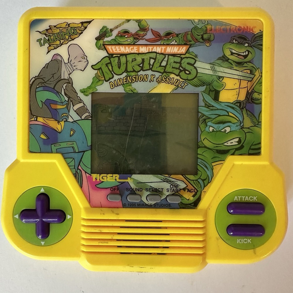 Tiger Teenage Mutant Ninja Turtles Dimension X Assault Electronic Handheld Read‎
